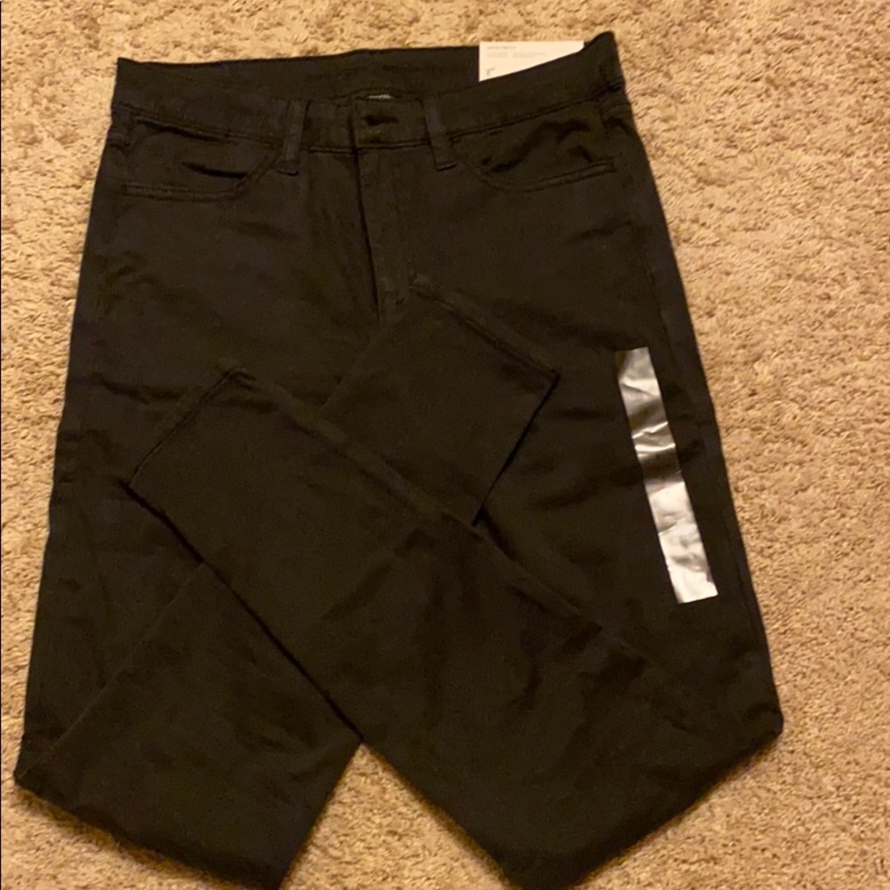 Black American Eagle Super Stretch Hi-Rise Jeans.